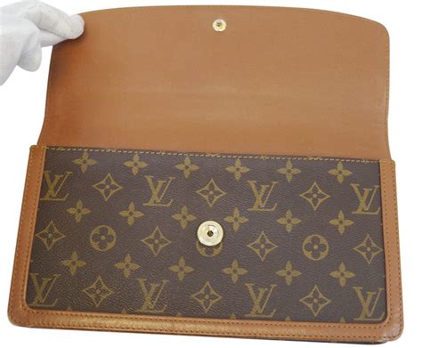 louis vuitton leather clutch bag|louis vuitton vintage clutch bag.